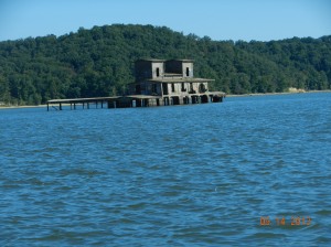 This old structure appears to be setting in several feet of water,  must have been some sort of building  along the river that was left and flooded when they created the lake. 